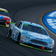 Kevin Harvick and Kyle Busch racing in Phoenix, the final race before the Homestead-Miami Speedway championship.
